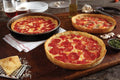 6 Deep Dish Pizzas (3 Sausage 3 Pepperoni) J572